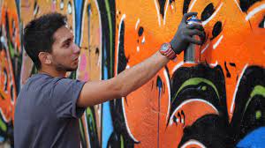 Spraying graffiti