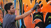 Spraying graffiti